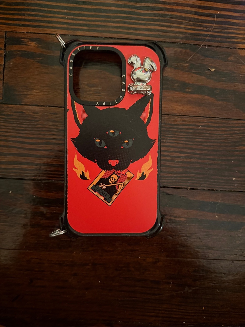 Casetify Red Three-Eyed Black Cat Graphic Phone Case with Silver Bunny Charm